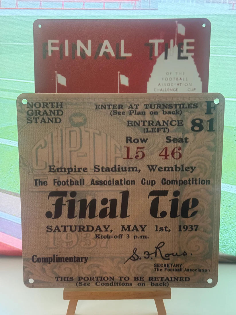 Vintage ticket for the F.A. Cup Final 1937 displayed on a stand.
