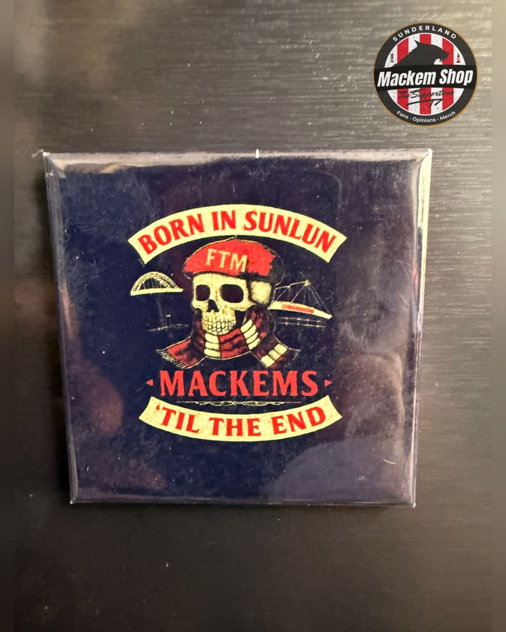 Fridge magnet with skull design and text on a metallic surface, featuring the 'Mackem Shop' logo.