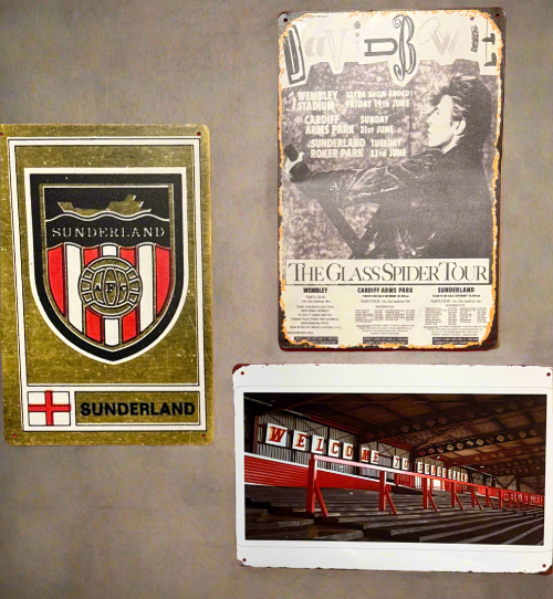 Three metal signs of Mackem shop featuring sports-related graphics and text on a gray wall.