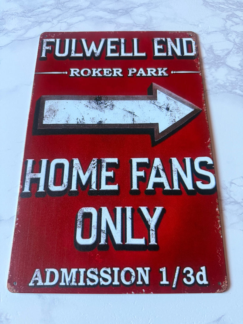 Vintage-style sign with text and an arrow on a red background