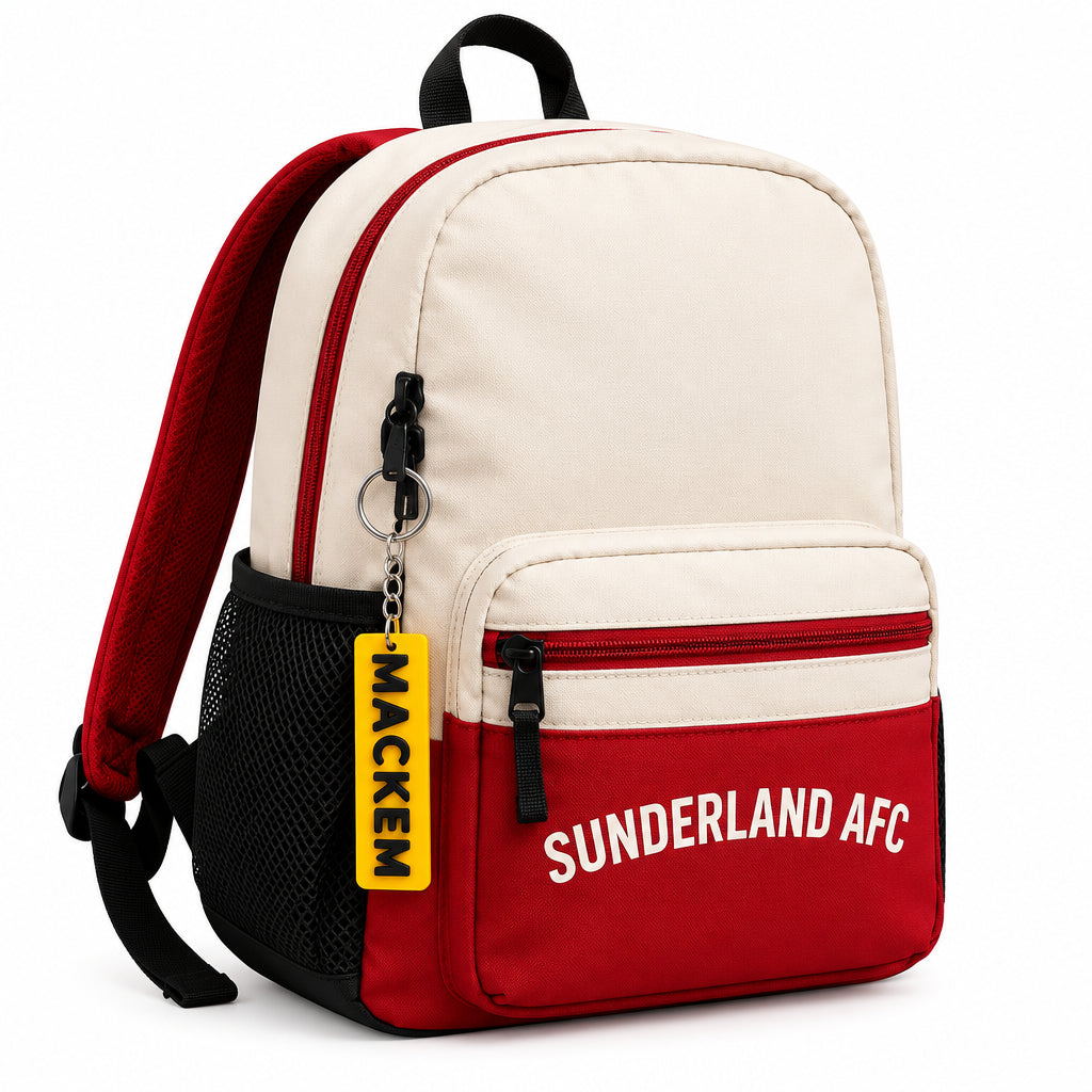 Backpack with Sunderland AFC branding with Mackem Keychain on it, on a wooden surface, with a blurred background.