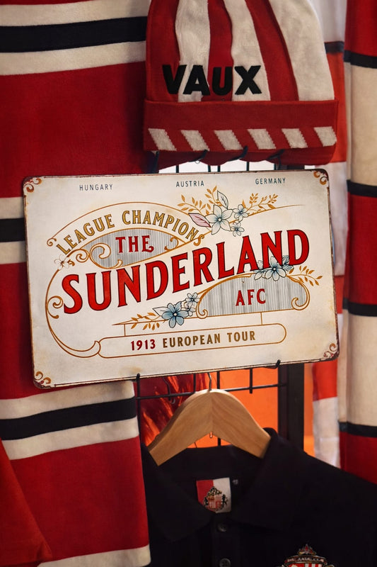 Vintage Sunderland AFC sign with sports equipment in the background