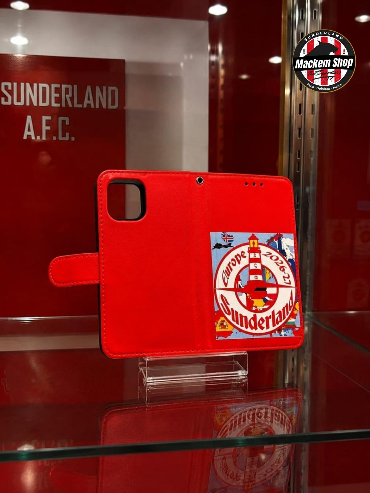 A red folio-style iPhone case with Sunderland European tour 2026-27 embedded on it.
