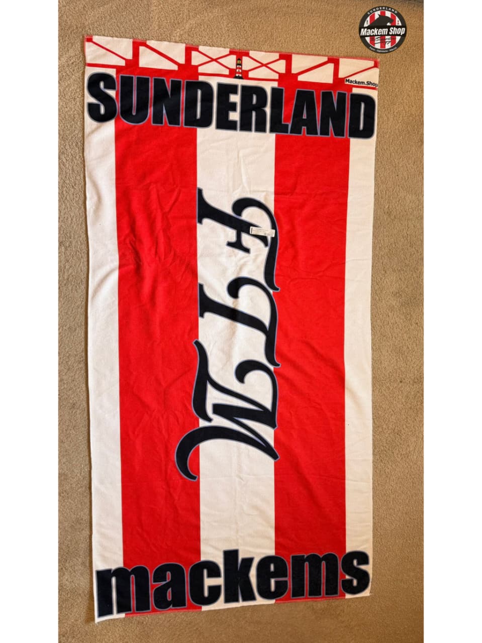 Sunderland FC Beach towel with red and white stripes and Sunderland, FTM, and Mackems text on it.