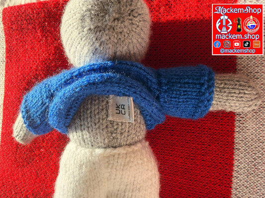 UK CA Handwash only Tag on a hand knitted Rabbit.