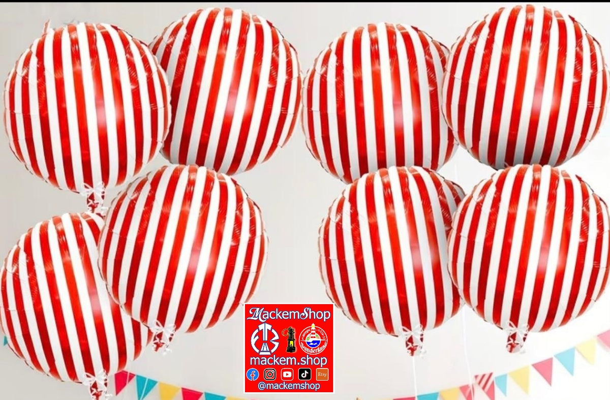 Six round foil balloons with red and white vertical stripes, arranged against a plain white background with a small multicolor bunting banner at the bottom and a MackemShop logo overlay near the bottom center.