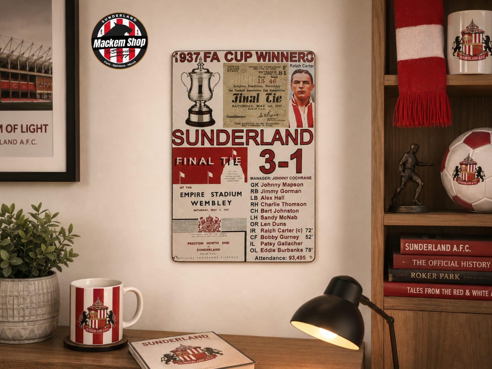 Sunderland AFC memorabilia including a Metal SIgn, mug, and books on a shelf.