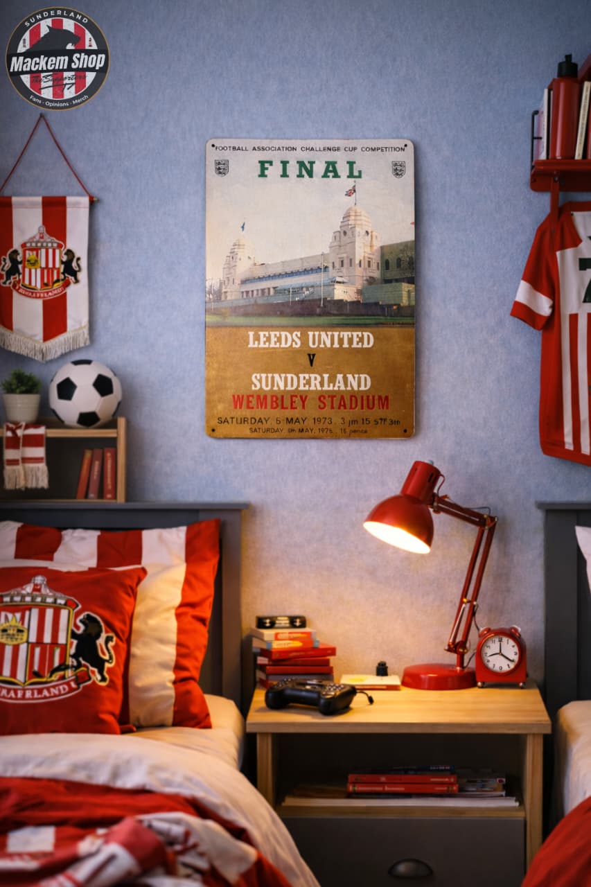Bedroom with sports-themed decor, including a Leeds United vs Sunderland poster on the wall.