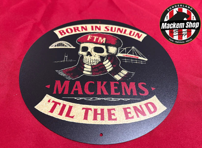 Circular logo with skull design and text on a red background, featuring the 'Mackem Shop' brand.