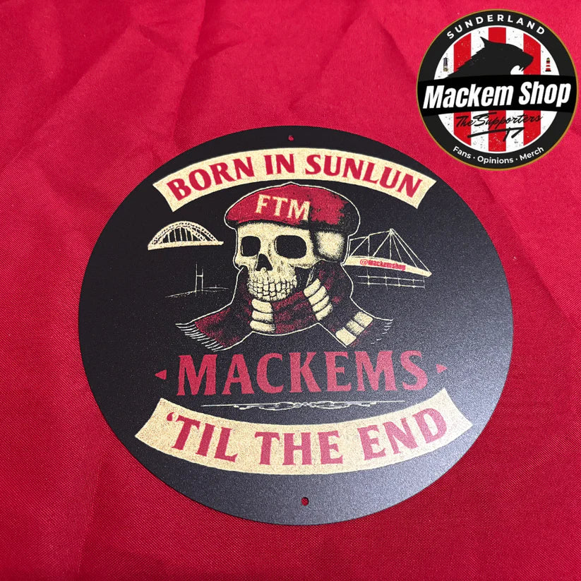 Circular design with skull and text on a red background, featuring the 'Sunderland Mackem Shop' logo.