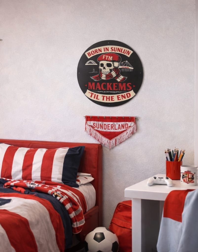 Bedroom with red and white bedding, a Football, and a Mackem shop wall decoration Metal sign.