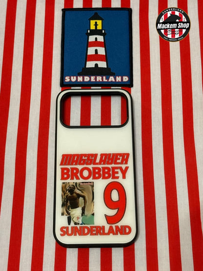 Patch with lighthouse design and text on a red and white striped background