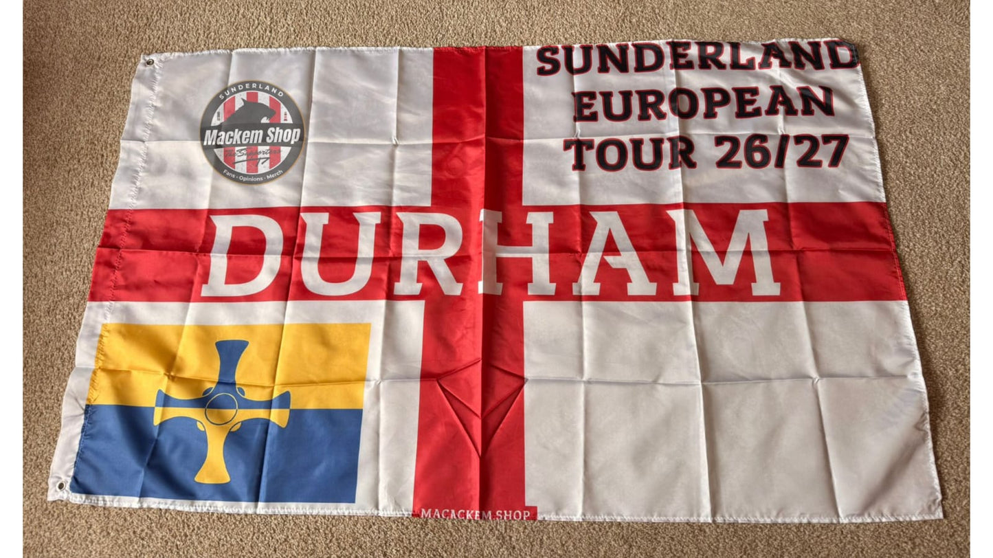 Flag with text 'Sunderland European Tour 26/27 Durham' and various symbols on a beige background