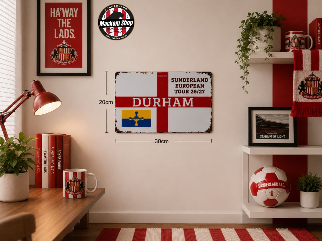 Room interior with a 'Durham' sign, books, and a lamp.