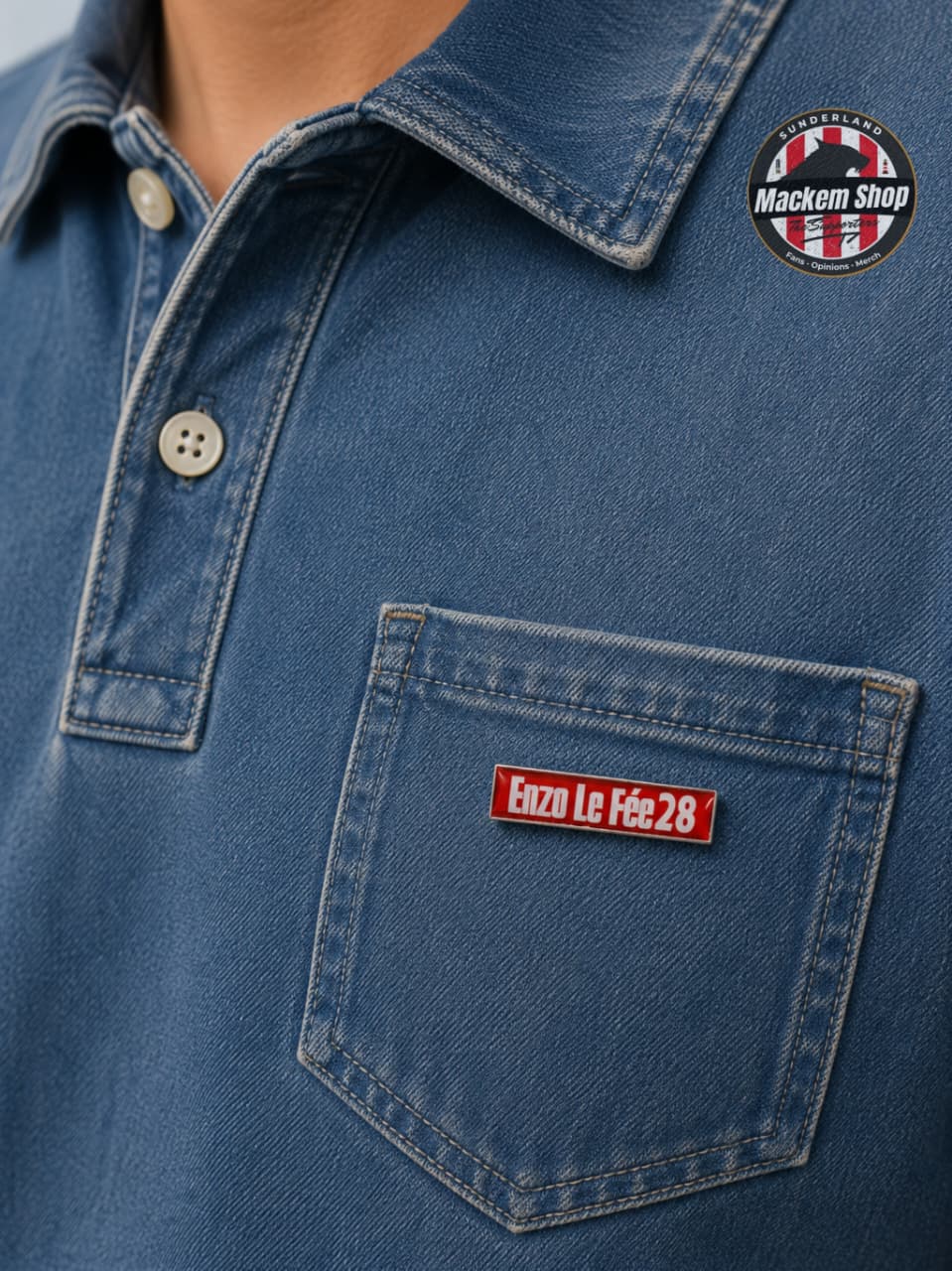 Blue denim shirt with a pocket patch with "Enzo Le Fee 28" pin Badge on it and Mackem Shop logo on the collar.