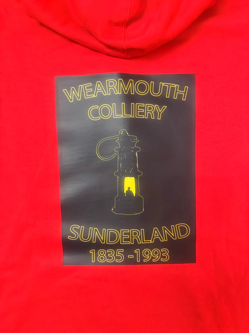 Red hoodie with a black patch featuring 'Wearmouth Colliery Sunderland 1835-1993' on a red background.