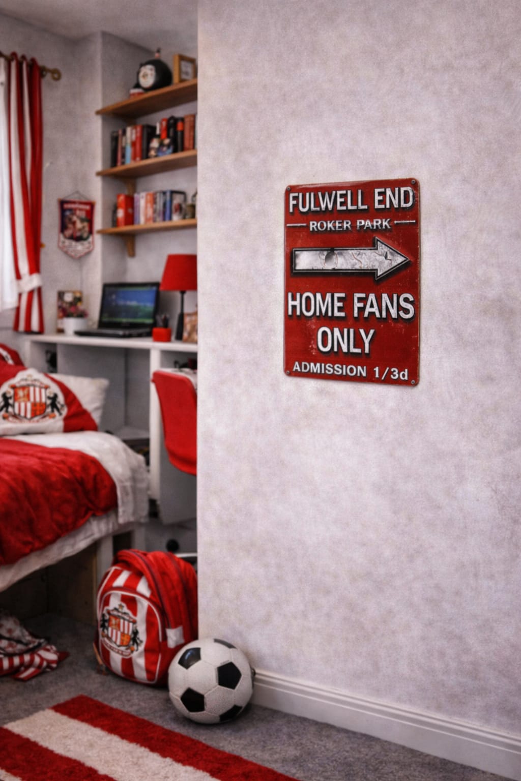 Children's bedroom with sports-themed decor, including a sign for Fulwell End Roker Park.