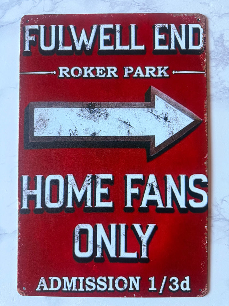 Vintage-style sign with text and an arrow on a red background