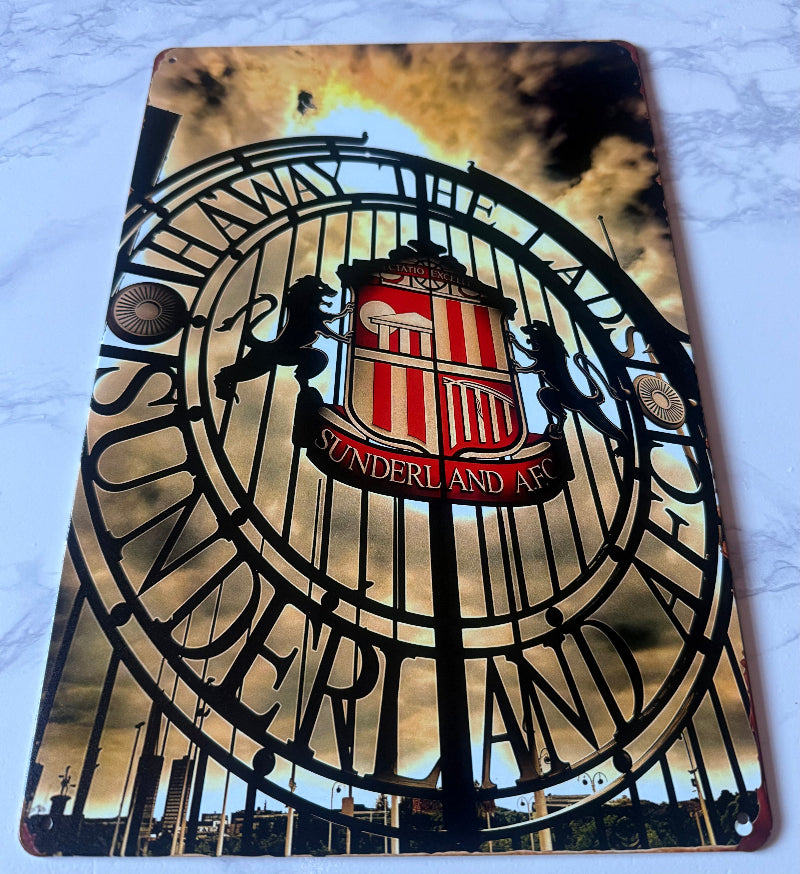 Metal sign with 'Sunderland AFC' logo and text on a white background