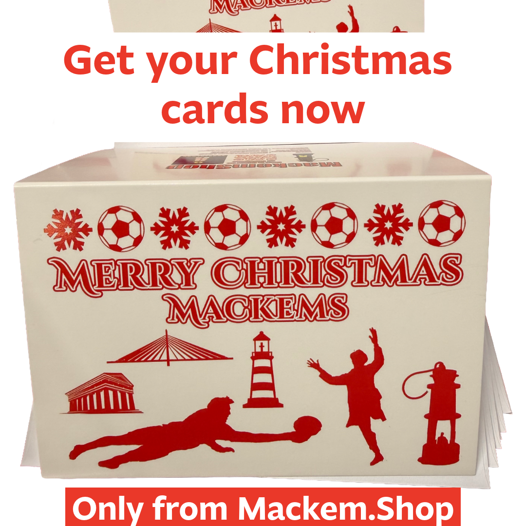 Box of Christmas cards with red designs and text, featuring the brand 'Mackems'.