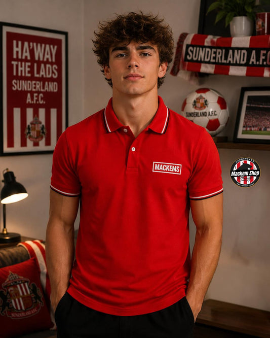Person wearing a red polo shirt with 'Mackems' logo in a room decorated with Sunderland A.F.C. memorabilia.