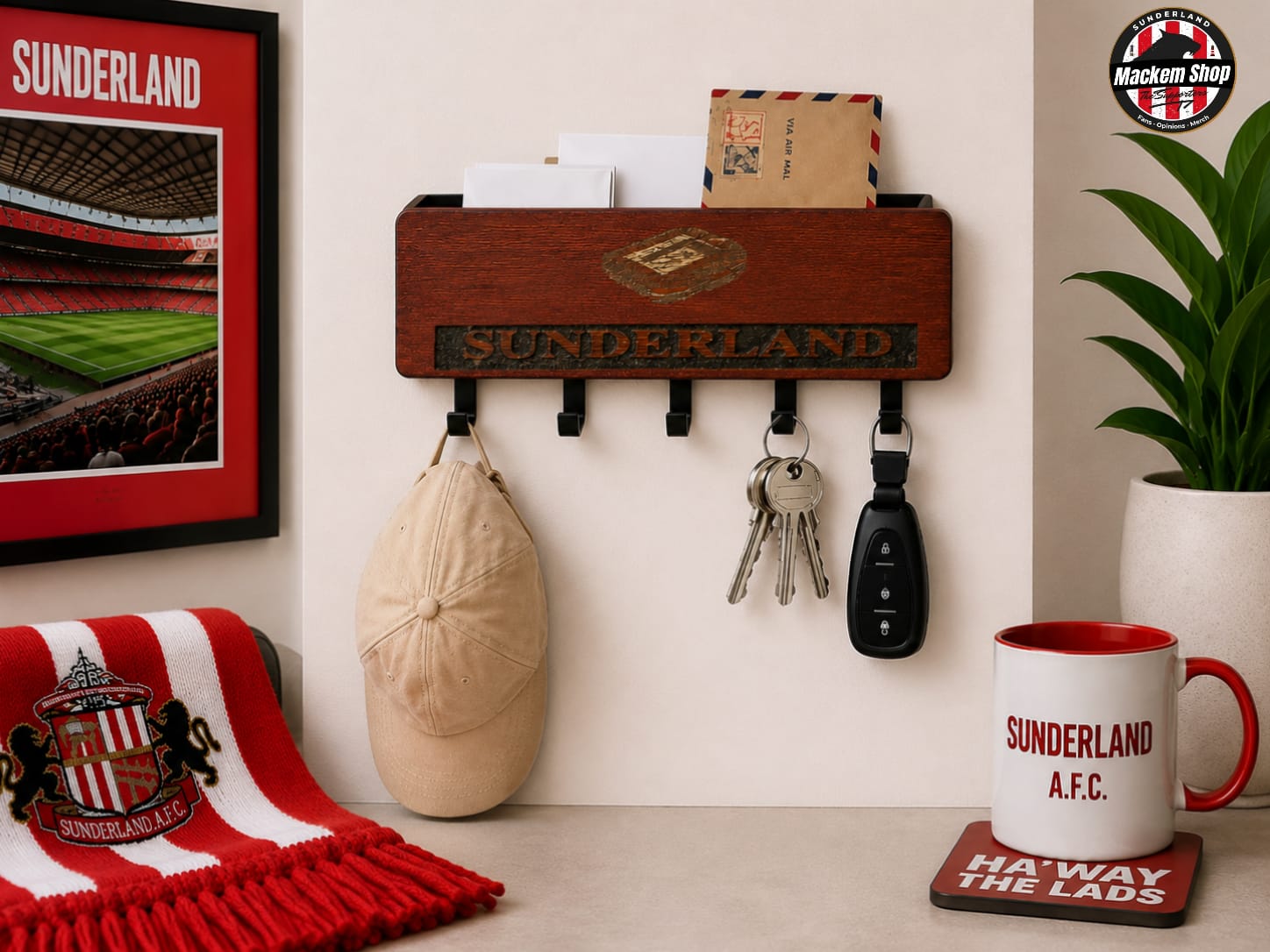 A wooden wall-mounted key holder and mail slot organizer with 'SUNDERLAND' lettering, shown in a styled room setting with a Sunderland A.F.