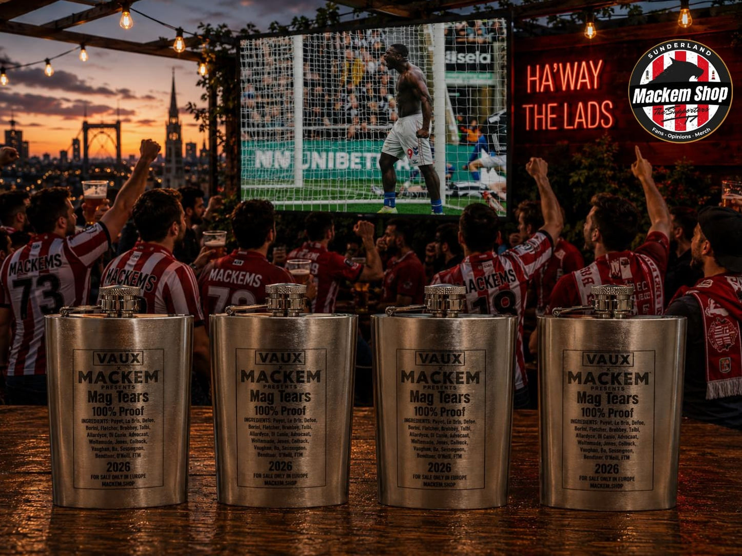 Four engraved silver Vaux Mackem mag tears Flask displayed on a bar counter in a crowded outdoor bar scene at sunset, with soccer fans in red and white striped jerseys celebrating in the background.