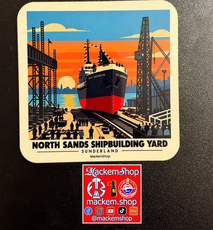 A coaster with illustration of north sands shipbuilding yard on a black surface with a MackemShop logo visible in middle down corner.