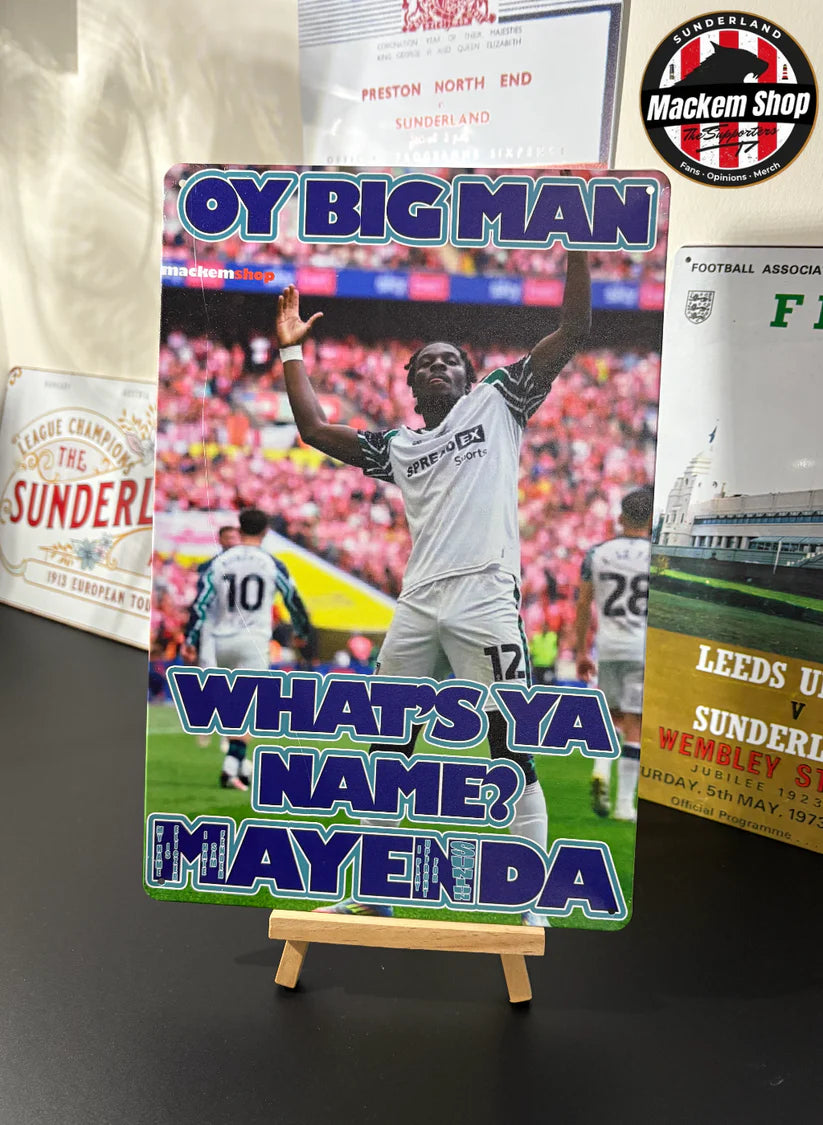 Soccer-themed poster with a player on a stand, surrounded by sports memorabilia.