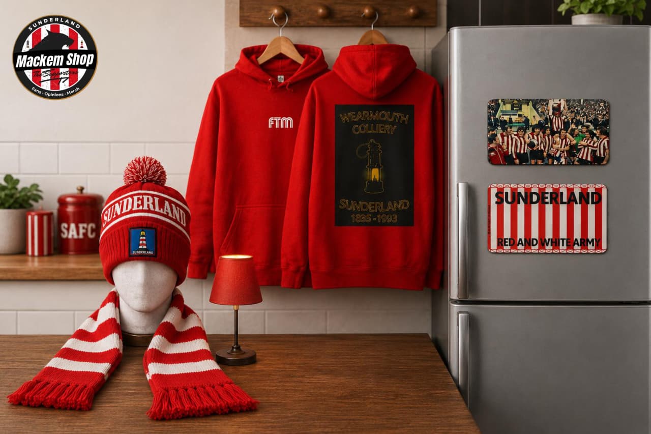 Red hoodies with 'Sunderland' branding, a beanie, and fridge magnets on a kitchen counter.