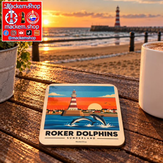 Roker Dolphins Sunderland coaster by MackemShop displayed on a rustic wooden table at sunset, with Roker Beach, the sea, and Roker Lighthouse in the background. A MackemShop Logo is visible on the Top left corner.