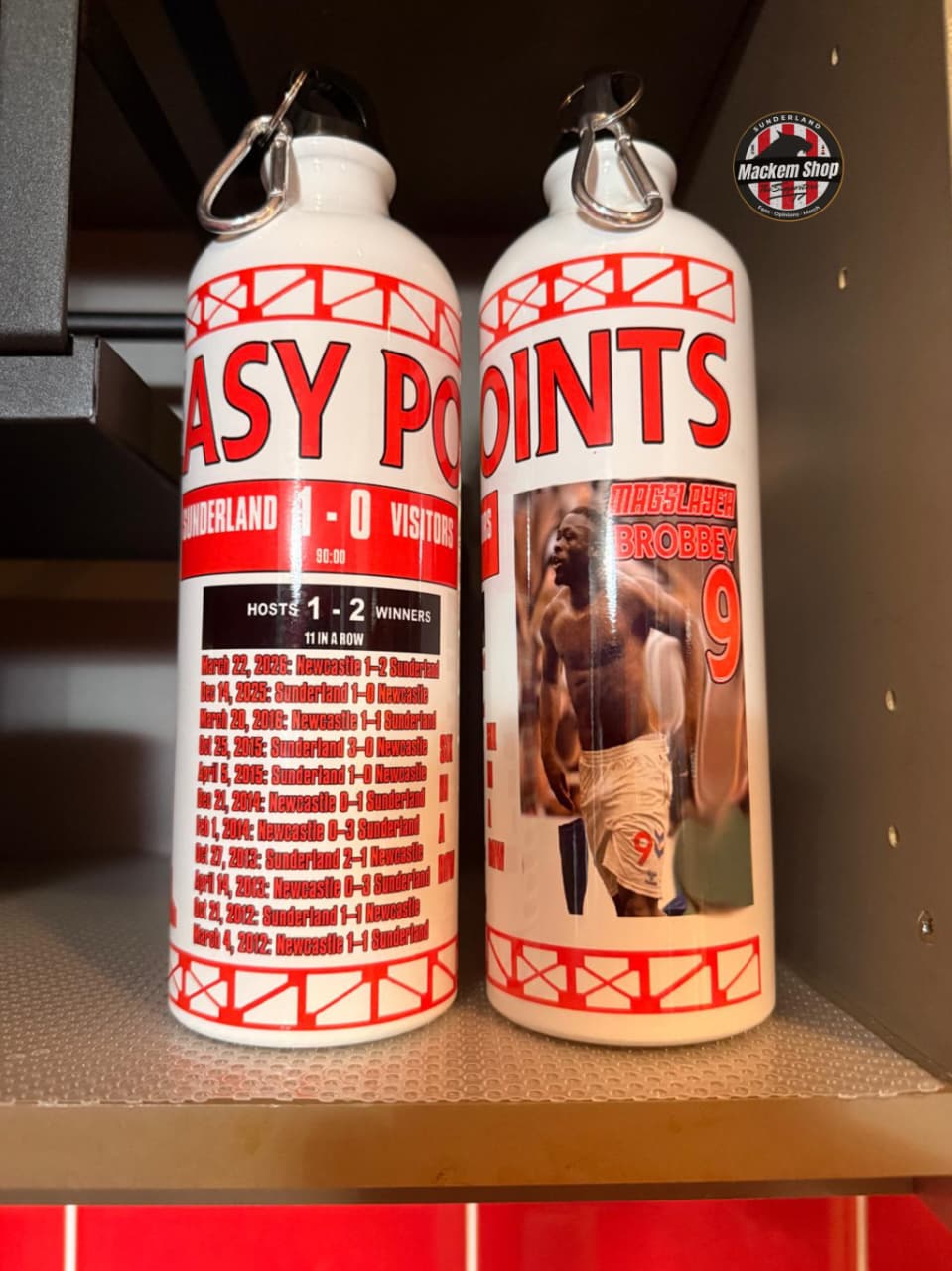 Two 'Easy Points' bottles with labels on a shelf.