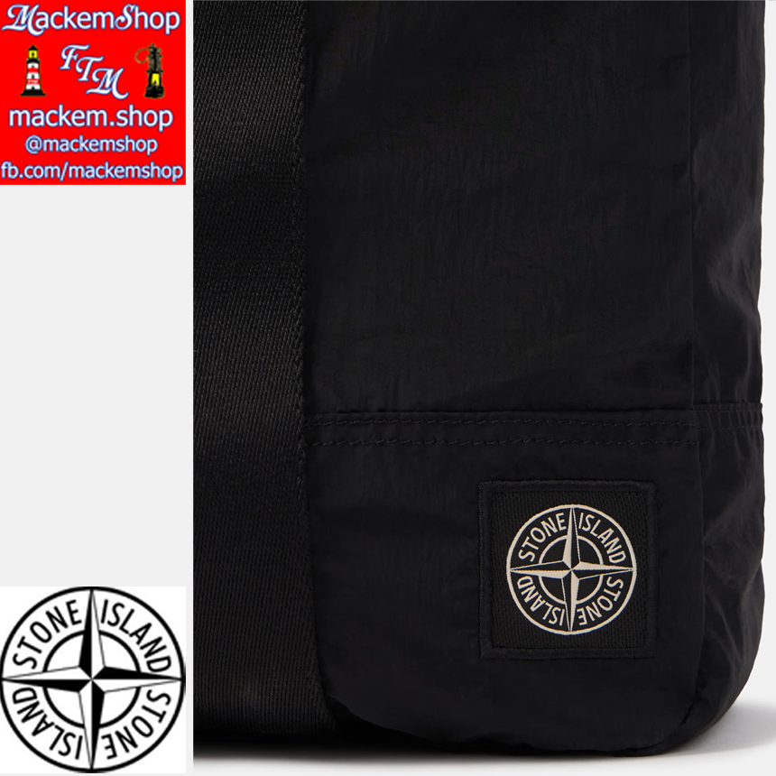 Black Stone Island bag with logo on a white background