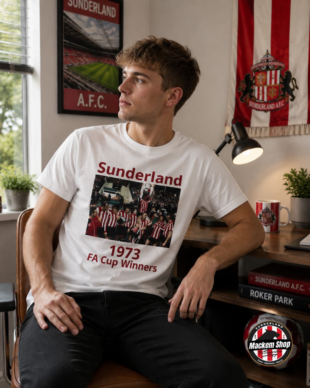 Man wearing a Sunderland t-shirt with a photo of 1973 FA Cup Winners in a room with sports-themed decor.