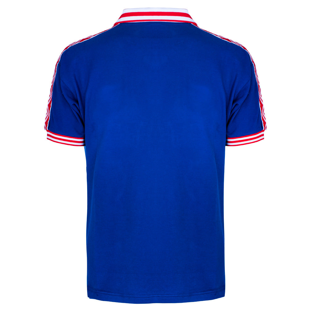 Blue polo shirt with red and white accents on a white background
