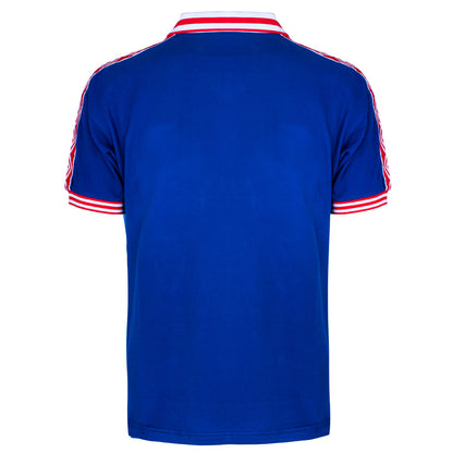 Blue polo shirt with red and white accents on a white background