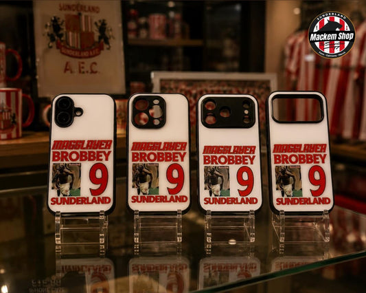 Four phone cases with 'Muggs Over Brobbey' text and number on a stand.