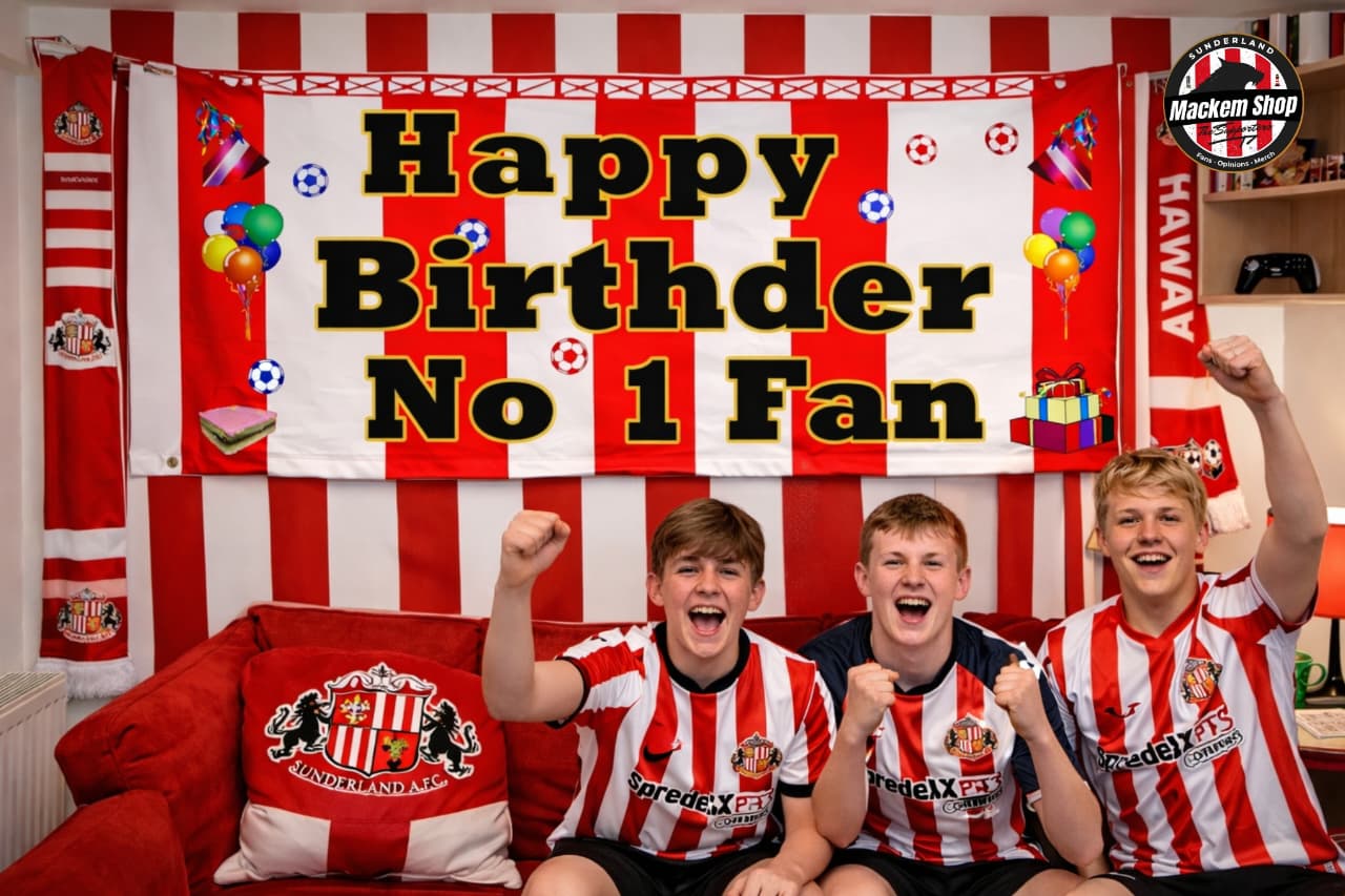 Three young men in sports jerseys celebrating a birthday with a 'Happy Birthday No 1 Fan' banner.