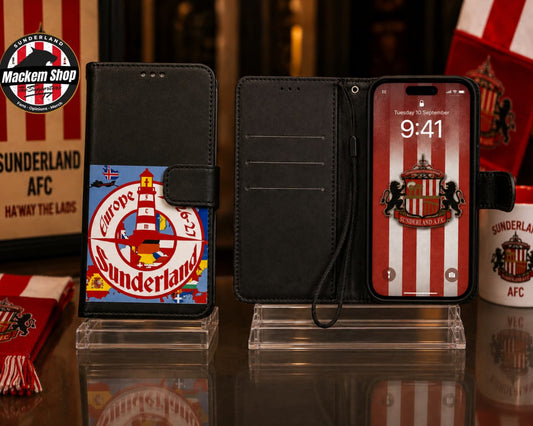 Black folio iphone case with Sunderland AFC branding, shown closed and open on clear display stands. The closed case features a colorful Sunderland AFC crest graphic on the front pocket, and the open case shows a black interior with card slots and a wrist strap.
