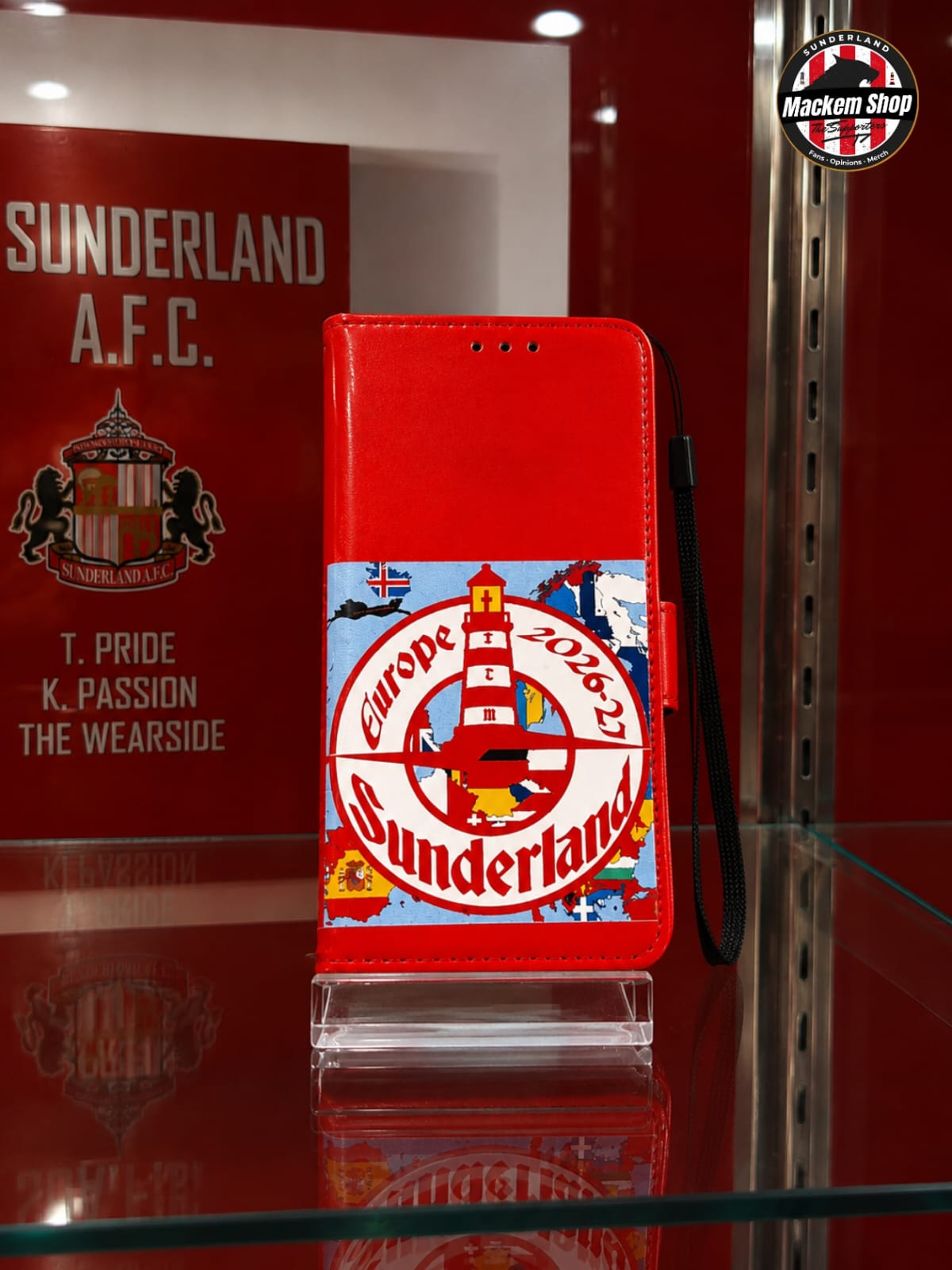 A red iPhone 12/13 mini- Flip cover by MackemShop with Sunderland AFC european tour patch work.
