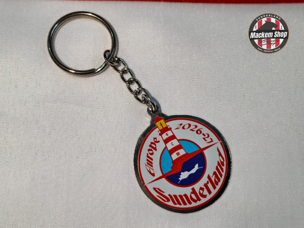 Sunderland Europe 26/27 Lighthouse Keychain with a logo on a gray background