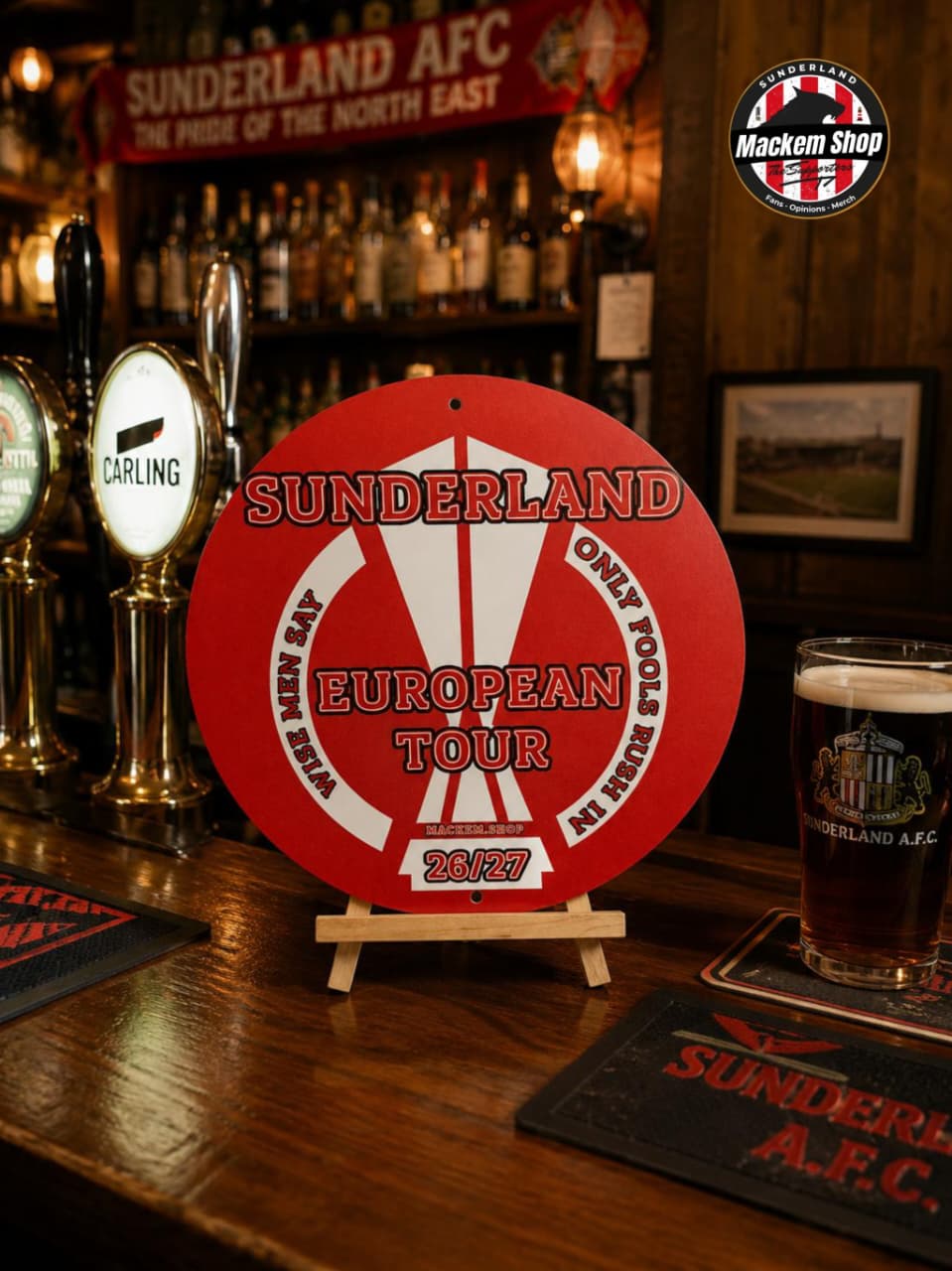 Sunderland AFC European Tour sign by Metal Sign on a bar counter with beer and decor.