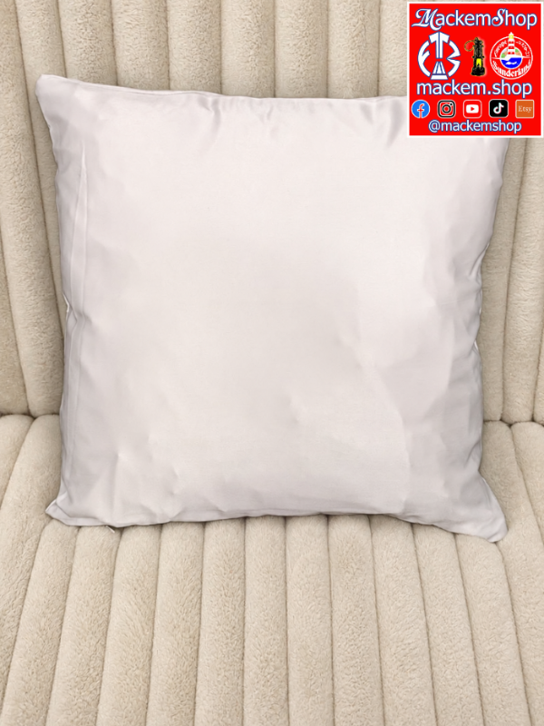 A plain white rectangular pillow cushion cover resting on a beige ribbed upholstered chair. A 'MackemShop' logo overlay is visible in the top right corner.
