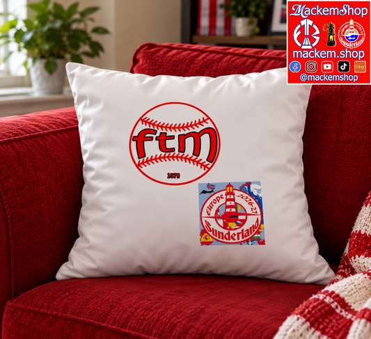 A white pillow with red and blue printed graphics, resting on a red armchair. The pillow features a baseball graphic with 'ftm' and a smaller 'Europe 2026-27 Sunderland' patch with a MackemShop logo.