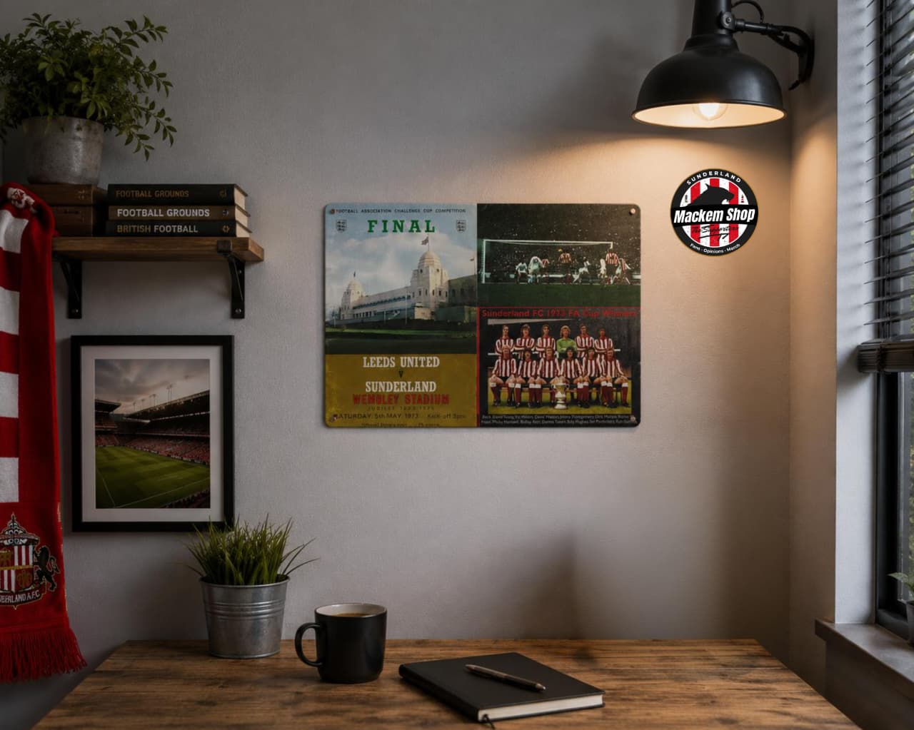 Wall with Sunderland Metal sign, a lamp, and a desk with a cup and notebook.