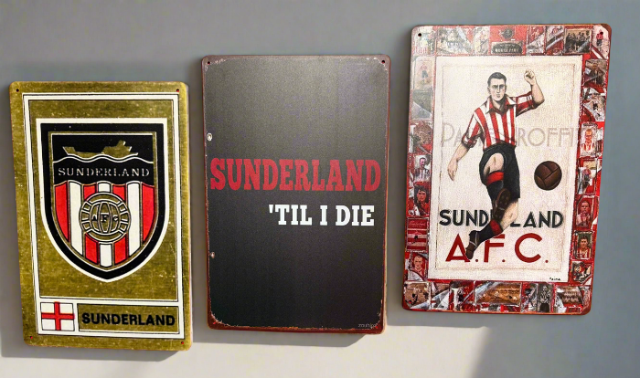 Three Sunderland AFC-themed metal signs on a gray background