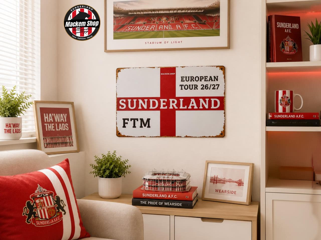 Living room with Sunderland AFC memorabilia, including a sign and books on a shelf.