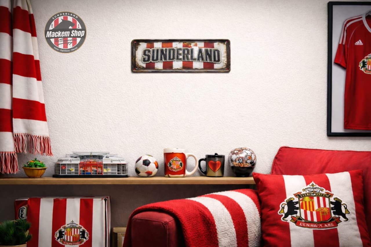 Sunderland-themed room decor with a sofa, cushions, and wall art.