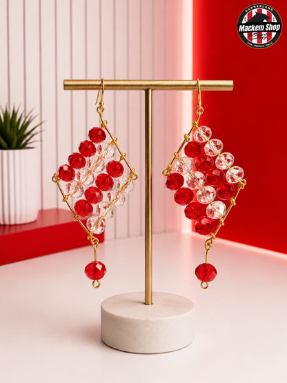Sunderland Red & White Crystal Earrings on a earrings holder.