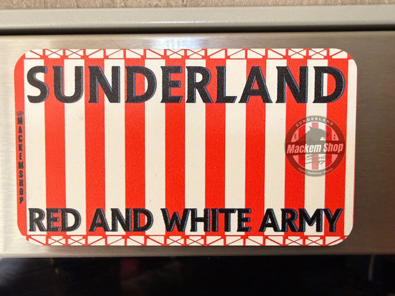 Sunderland sticker with red and white design on a vehicle